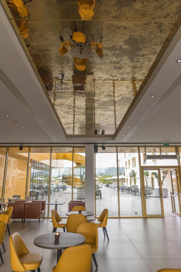 Mk Hotel Tirana Rinas Eksteriør bilde The ceiling of the lobby
